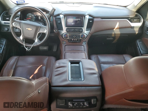2017 Chevrolet Suburban Premier with VIN 1GNSCJKCXHR348044, listed as a Copart auction lot 55957535 with 112,131 mi miles and Salvage title. Bid and sale history available at DreamBid. Image 8.
