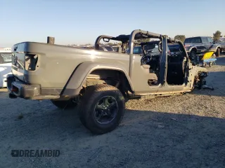 2021 Jeep Gladiator Rubicon z VIN 1C6JJTBMXML503128, wystawiony jako Copart lot #42813725 z przebiegiem Nie podano mil oraz Szkoda całkowita • Salvage title. Historia ofert i sprzedaży dostępna na DreamBid. Obrazek 3.