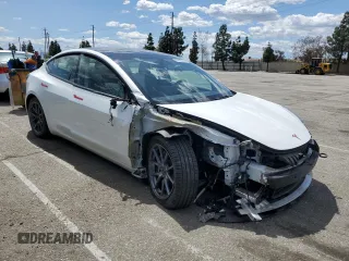 2022 Tesla Model 3 Long Range with VIN 5YJ3E1EB4NF139023, listed as a Copart auction lot 51410345 with 54,789 mi miles and Salvage Title. Bid and sale history available at DreamBid. Image 4.
