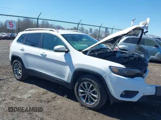 2019 Jeep Cherokee Latitude Plus with VIN 1C4PJMLB2KD355361, listed as a IAAI auction lot 41803131 with 95,168 mi miles. Bid and sale history available at carsss.com. Image 1.