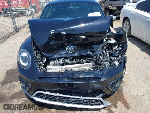 2018 Volkswagen Beetle Dune with VIN 3VWSD7AT1JM702354, listed as a IAAI auction lot 41993527 with 50,952 mi miles and . Bid and sale history available at DreamBid. Image 6.