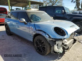 2017 MINI Clubman Cooper S with VIN WMWLN9C36H2E50194, listed as a Copart auction lot 83108064 with 41,555 mi miles and Salvage Title. Bid and sale history available at carsss.com. Image 4.