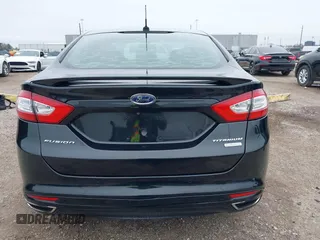 2014 Ford Fusion Titanium with VIN 3FA6P0K9XER364392, listed as a IAAI auction lot 41642439 with 130,302 mi miles and . Bid and sale history available at DreamBid. Image 15.