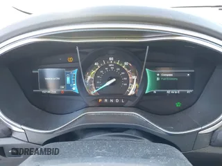 2015 Ford Fusion S Hybrid with VIN 3FA6P0UU7FR307568, listed as a IAAI auction lot 41421139 with 152,186 mi miles. Bid and sale history available at carsss.com. Image 7.