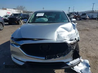 2019 Mazda CX-5 Sport with VIN JM3KFBBM7K0668830, listed as a IAAI auction lot 42069505 with Not Provided miles and . Bid and sale history available at DreamBid. Image 11.