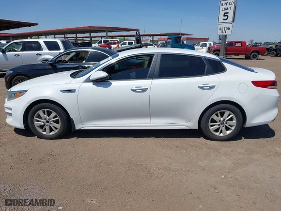 2016 Kia Optima LX with VIN 5XXGT4L33GG033022, listed as a IAAI auction lot 41981693 with 137,996 mi miles. Bid and sale history available at carsss.com. Image 14.