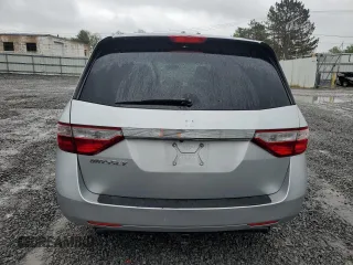 2013 Honda Odyssey EX-L с VIN 5FNRL5H64DB081600, выставлен на аукционе Copart как лот 58409145 с пробегом 186 588 миль миль и Списание • Salvage title. История ставок и продаж доступна на DreamBid. Изображение 6.
