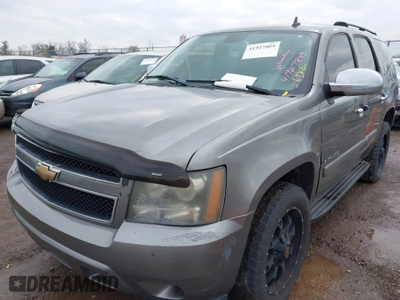 2007 Chevrolet Tahoe LT with VIN 1GNFC13077J278764, listed as a IAAI auction lot 41927809 with 211,943 mi miles and . Bid and sale history available at DreamBid. Image 2.