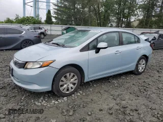 2012 Honda Civic LX z VIN 19XFB2F5XCE371486, wystawiony jako Copart lot #57949945 z przebiegiem 119 690 mil mil oraz Szkoda całkowita • Salvage title. Historia ofert i sprzedaży dostępna na DreamBid. Obrazek 1.