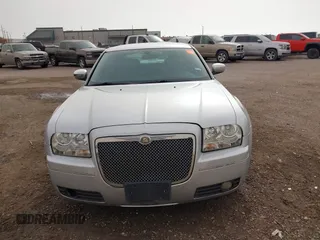 2006 Chrysler 300 Touring with VIN 2C3KA53G36H384442, listed as a IAAI auction lot 41817539 with 129,123 mi miles. Bid and sale history available at carsss.com. Image 12.