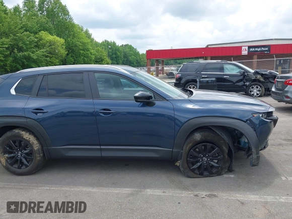 2023 Mazda CX-50 S Preferred Plus z VIN 7MMVABCM4PN119583, wystawiony jako IAAI lot #42108949 z przebiegiem 26 254 mil mil oraz . Historia ofert i sprzedaży dostępna na DreamBid. Obrazek 13.