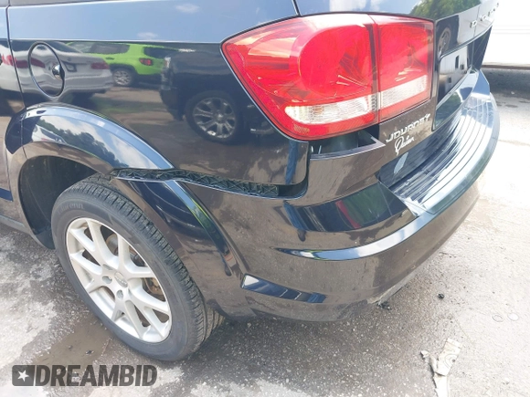 2011 Dodge Journey Crew with VIN 3D4PG3FGXBT511854, listed as a IAAI auction lot 42390292 with 145,991 mi miles and . Bid and sale history available at DreamBid. Image 19.
