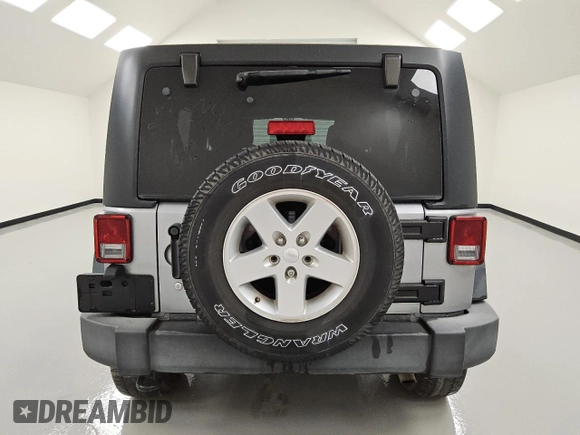 2018 Jeep Wrangler JK Unlimited Sport S with VIN 1C4BJWDG6JL931408, listed as a Copart auction lot 50547165 with 64,485 mi miles and Clean Title. Bid and sale history available at carsss.com. Image 6.