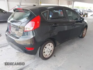 2014 Ford Fiesta S with VIN 3FADP4TJ7EM101992, listed as a IAAI auction lot 42487696 with 205,585 mi miles and . Bid and sale history available at DreamBid. Image 4.