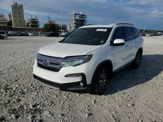 2022 Honda Pilot Touring 7-Passenger with VIN 5FNYF5H65NB011768, listed as a Copart auction lot 74134503 with 27,517 mi miles and Salvage title. Bid and sale history available at DreamBid. Image 11.