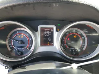 2013 Dodge Journey American Value with VIN 3C4PDCAB1DT715799, listed as a Copart auction lot 52404815 with 185,559 mi miles and Salvage Title. Bid and sale history available at DreamBid. Image 9.