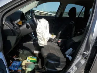 2015 Mazda CX-5 Touring with VIN JM3KE2CY7F0435914, listed as a Copart auction lot 61885704 with 0 mi miles and Salvage Title. Bid and sale history available at carsss.com. Image 7.