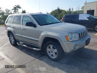 2007 Jeep Grand Cherokee Laredo with VIN 1J8GS48K77C545071, listed as a IAAI auction lot 41999998 with 144,966 mi miles. Bid and sale history available at carsss.com. Image 1.