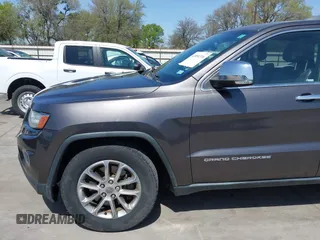2014 Jeep Grand Cherokee Limited z VIN 1C4RJFBT0EC241030, wystawiony jako IAAI lot #41851316 z przebiegiem 104 344 mil mil oraz . Historia ofert i sprzedaży dostępna na DreamBid. Obrazek 19.