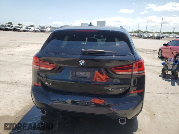 2021 BMW X1 sDrive28i z VIN WBXJG7C04M5U03124, wystawiony jako Copart lot #54447515 z przebiegiem 11 794 mil mil oraz Szkoda całkowita • Salvage title. Historia ofert i sprzedaży dostępna na DreamBid. Obrazek 6.