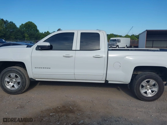 2018 Chevrolet Silverado 1500 LT with VIN 1GCVKREHXJZ314495, listed as a IAAI auction lot 40043813 with 158,597 mi miles. Bid and sale history available at carsss.com. Image 14.