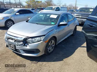 2016 Honda Civic LX with VIN 19XFC2F5XGE230467, listed as a IAAI auction lot 41768980 with 145,592 mi miles. Bid and sale history available at carsss.com. Image 2.