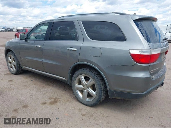 2011 Dodge Durango Citadel with VIN 1D4RE5GG5BC664579, listed as a IAAI auction lot 40812809 with 209,743 mi miles. Bid and sale history available at carsss.com. Image 3.