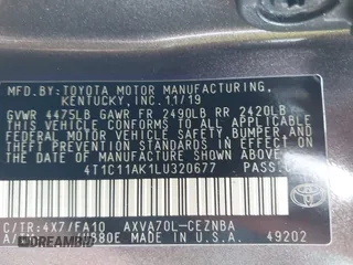 2020 Toyota Camry LE with VIN 4T1C11AK1LU320677, listed as a IAAI auction lot 41914421 with 94,291 mi miles. Bid and sale history available at carsss.com. Image 9.