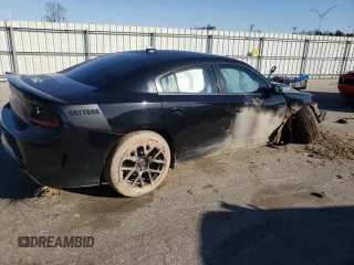 2018 Dodge Charger Daytona with VIN 2C3CDXCT4JH283018, listed as a Copart auction lot 48707905 with 121,624 mi miles and Salvage title. Bid and sale history available at DreamBid. Image 3.