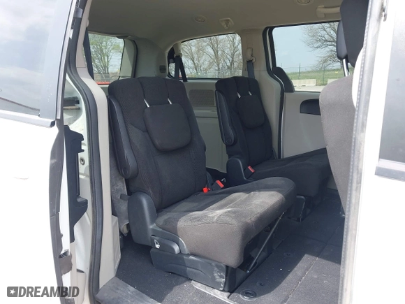 2016 Dodge Grand Caravan SE with VIN 2C4RDGBG2GR345657, listed as a IAAI auction lot 42104710 with 81,916 mi miles. Bid and sale history available at carsss.com. Image 8.
