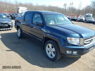 2011 Honda Ridgeline RTL with VIN 5FPYK1F51BB011686, listed as a IAAI auction lot 41790303 with 110,648 mi miles. Bid and sale history available at carsss.com. Image 6.