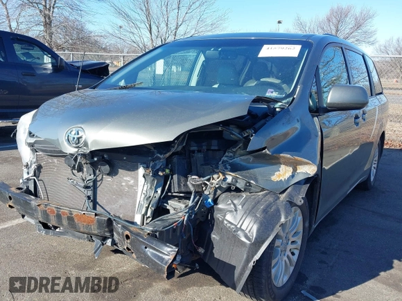 2011 Toyota Sienna XLE AAS with VIN 5TDYK3DC4BS072693, listed as a IAAI auction lot 41579262 with 146,201 mi miles. Bid and sale history available at carsss.com. Image 6.