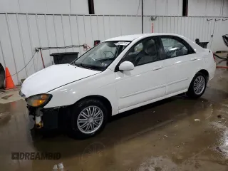2009 Kia Spectra EX with VIN KNAFE221895593262, listed as a Copart auction lot 63397215 with 92,683 mi miles and Salvage title. Bid and sale history available at DreamBid. Image 1.