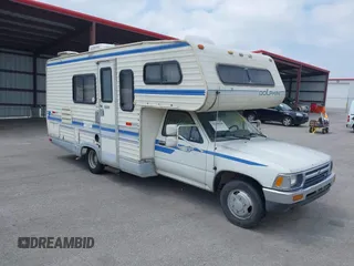 1992 Toyota Pickup z VIN JT5VN94T7N0028591, wystawiony jako IAAI lot #42388640 z przebiegiem 84 270 mil mil oraz . Historia ofert i sprzedaży dostępna na DreamBid. Obrazek 1.