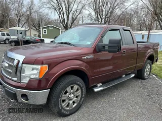 2009 Ford F-150 XL with VIN 1FTPX14V59FA13522, listed as a IAAI auction lot 41912606 with 157,185 mi miles. Bid and sale history available at carsss.com. Image 2.