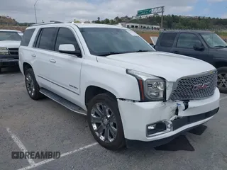 2016 GMC Yukon Denali z VIN 1GKS2CKJ7GR128210, wystawiony jako IAAI lot #42054611 z przebiegiem 103 113 mil mil oraz . Historia ofert i sprzedaży dostępna na DreamBid. Obrazek 1.