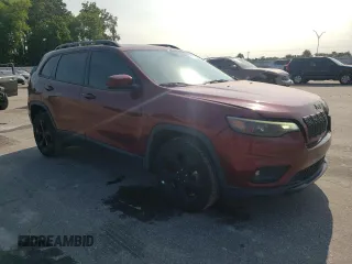 2019 Jeep Cherokee Altitude with VIN 1C4PJLLB2KD392971, listed as a Copart auction lot 59190355 with 163,471 mi miles and Salvage title. Bid and sale history available at DreamBid. Image 4.