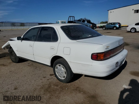 1992 Toyota Camry LE with VIN 4T1SK12E0NU064956, listed as a Copart auction lot 50665925 with 228,909 mi miles and Salvage Title. Bid and sale history available at carsss.com. Image 2.