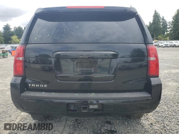 2016 Chevrolet Tahoe LT with VIN 1GNSCBKCXGR219824, listed as a Copart auction lot 61375945 with 135,817 mi miles and Salvage title. Bid and sale history available at DreamBid. Image 6.