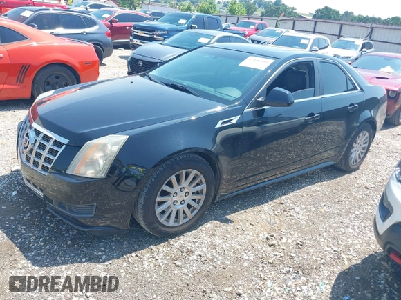 2013 Cadillac CTS Luxury with VIN 1G6DE5E55D0118722, listed as a IAAI auction lot 42448616 with 131,906 mi miles and . Bid and sale history available at DreamBid. Image 2.