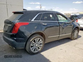 2018 Cadillac XT5 Premium Luxury AWD with VIN 1GYKNFRS6JZ116893, listed as a Copart auction lot 61195275 with 150,618 mi miles and Salvage title. Bid and sale history available at DreamBid. Image 3.