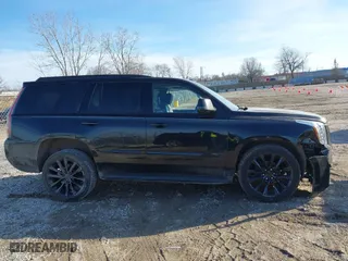 2018 Cadillac Escalade Luxury with VIN 1GYS4BKJ1JR296393, listed as a IAAI auction lot 41740934 with 83,432 mi miles. Bid and sale history available at carsss.com. Image 14.
