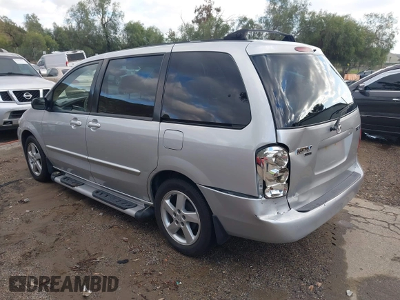 2003 Mazda MPV LX z VIN JM3LW28J730339693, wystawiony jako IAAI lot #41581533 z przebiegiem 56 275 mil mil oraz . Historia ofert i sprzedaży dostępna na DreamBid. Obrazek 3.