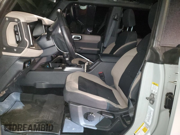 2023 Ford Bronco with VIN 1FMDE5DH8PLB33013, listed as a Copart auction lot 83039524 with 22,285 mi miles and Salvage Title. Bid and sale history available at carsss.com. Image 7.