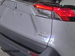 2022 Toyota RAV4 Hybrid XLE Premium with VIN 4T3B6RFV5NU085564, listed as a IAAI auction lot 42854215 with 49,616 mi miles and . Bid and sale history available at DreamBid. Image 14.