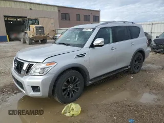 2017 Nissan Armada Platinum z VIN JN8AY2NE5H9706597, wystawiony jako Copart lot #50398215 z przebiegiem Nie podano mil oraz Szkoda całkowita • Salvage title. Historia ofert i sprzedaży dostępna na DreamBid. Obrazek 1.