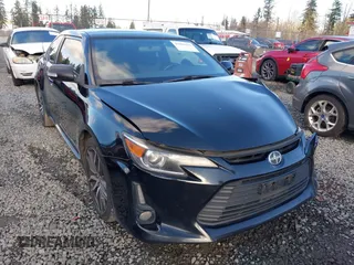 2015 Scion tC z VIN JTKJF5C74FJ010874, wystawiony jako IAAI lot #41496551 z przebiegiem 132 586 mil mil oraz . Historia ofert i sprzedaży dostępna na DreamBid. Obrazek 1.