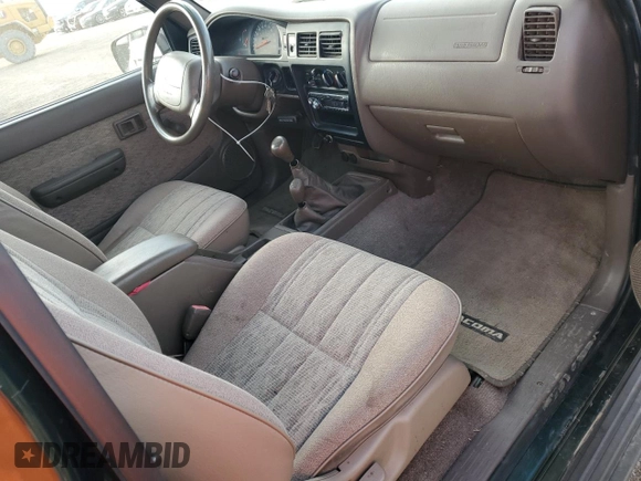 1999 Toyota Tacoma with VIN 4TAPM62N6XZ417283, listed as a Copart auction lot 84322844 with 74,233 mi miles and Clean Title. Bid and sale history available at DreamBid. Image 8.