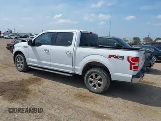2018 Ford F-150 XL with VIN 1FTEW1E59JKF84452, listed as a IAAI auction lot 42175251 with 161,952 mi miles and . Bid and sale history available at carsss.com. Image 3.
