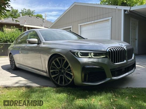 2020 BMW 7 Series 750i xDrive with VIN WBA7U2C05LGJ59633, listed as a Copart auction lot 59625975 with 73,471 mi miles and Clean title. Bid and sale history available at DreamBid. Image 4.